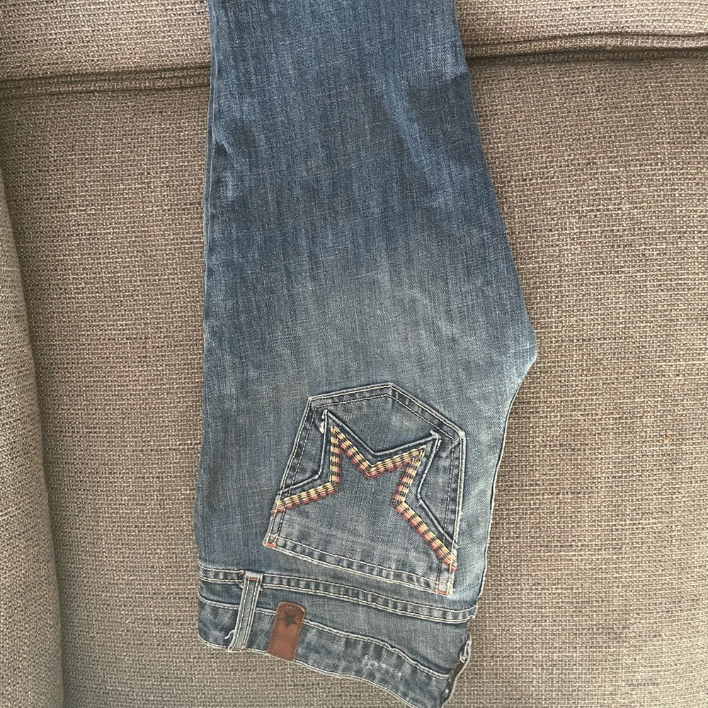 peoples liberation bootcut low waisted star pocket jeans